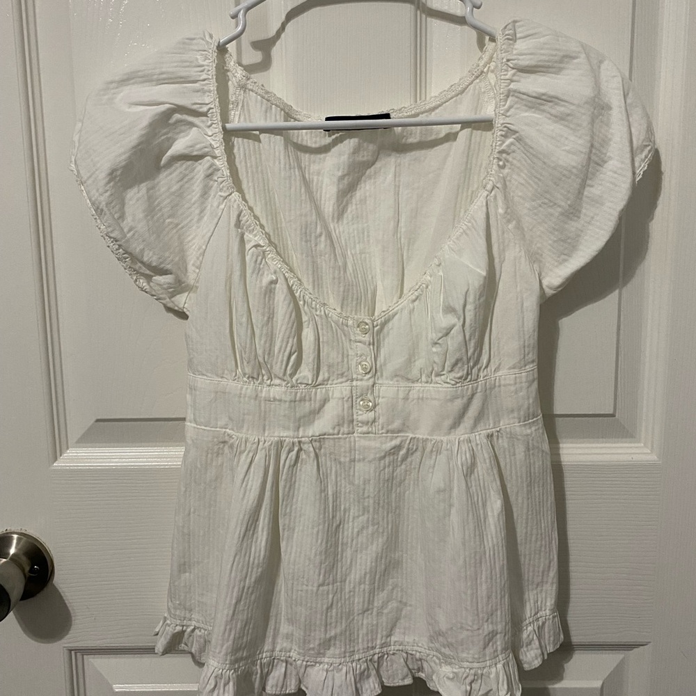 Brandy Melville Cream Blouse with Ruffle Hem